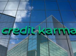 Credit Karma logo on glass. Intuit is acquiring Credit Karma.